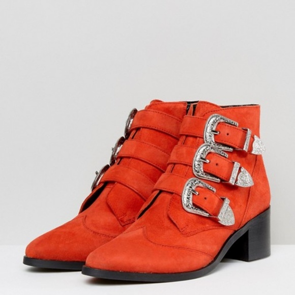 red buckle ankle boots